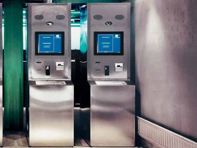 Stainless-steel automated entry terminals at Gamer’s Paradise.